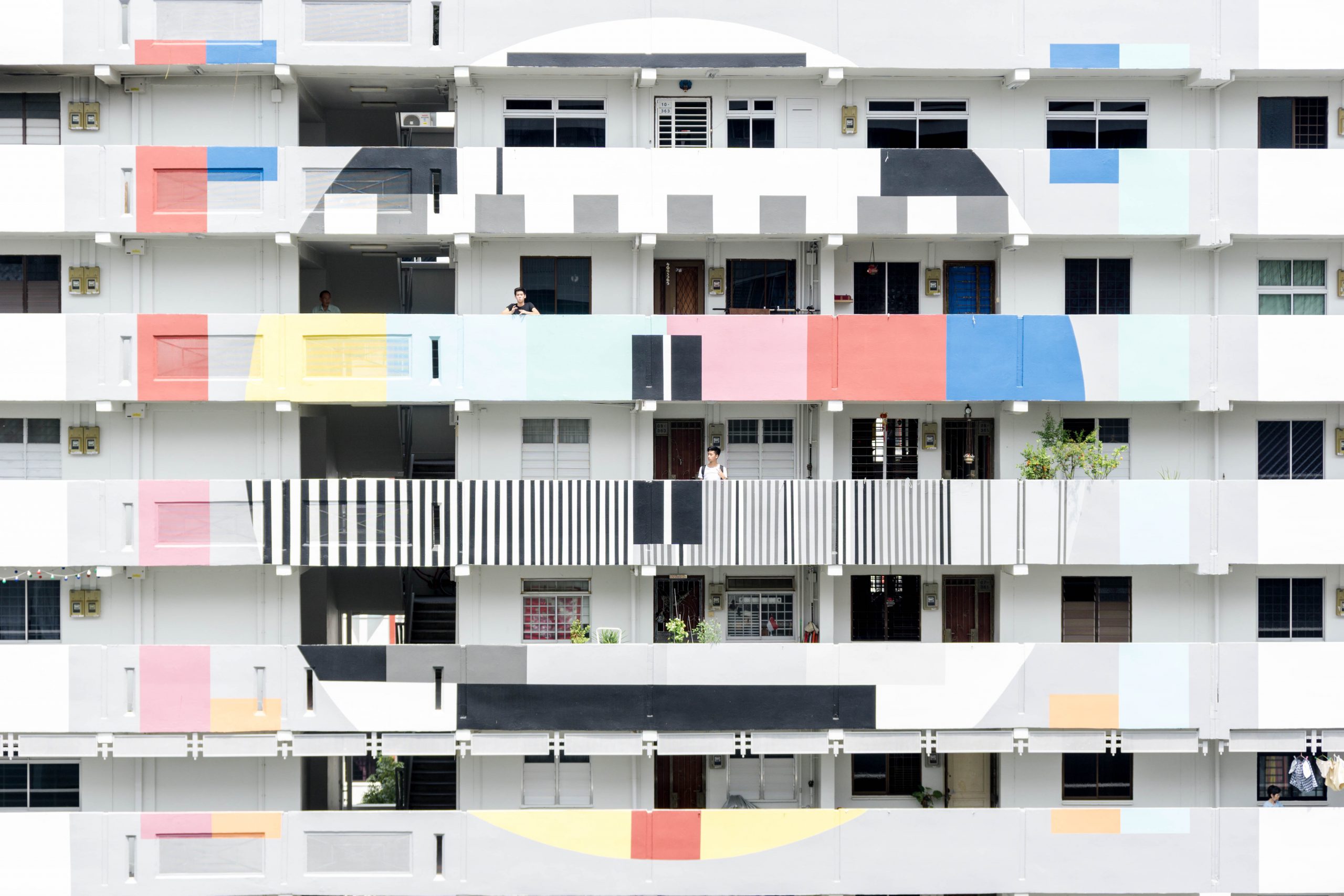 Colourful balconies in an apartment building.