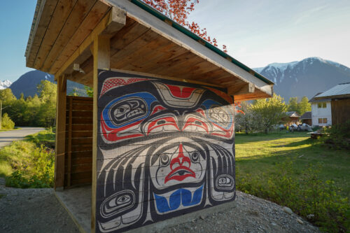 Bus shelters with designs by local artists can be found throughout the Nuxalk Nation community, on the Central Coast of B.C., in the Bella Coola Valley. (Shannon Lough/Ecotrust Canada)